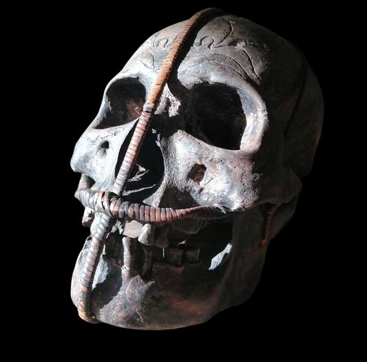 Bound and carved Ifugau tribal skull